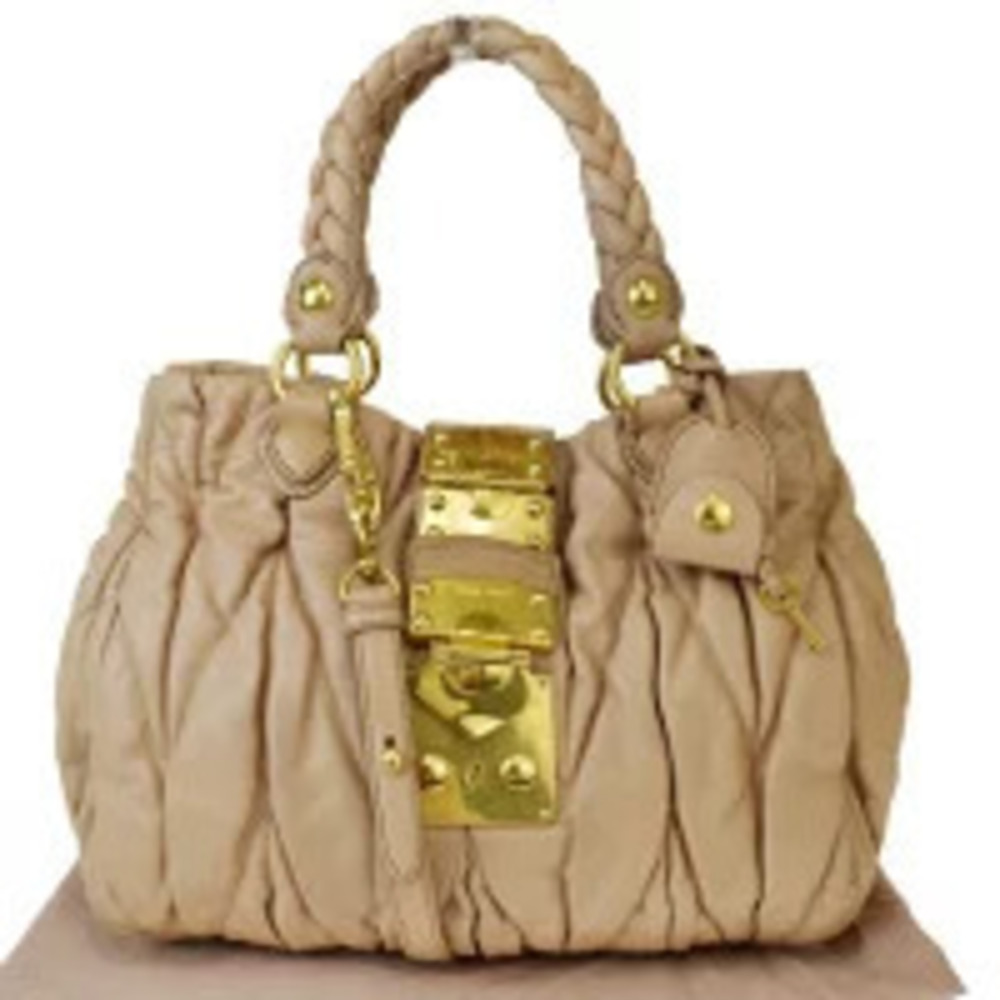 Miu Miu Matelasse leather handbag beige braided handles Pink